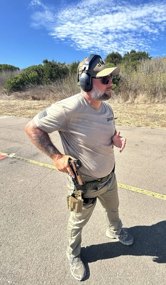 Brett Lane standing on a range