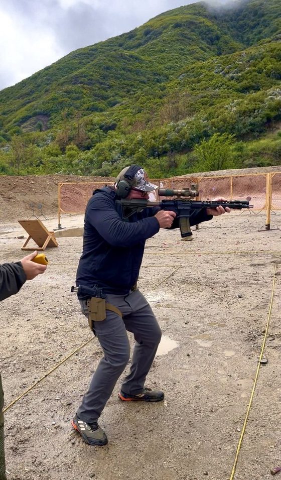 Chris Jones firing a rifle on a range